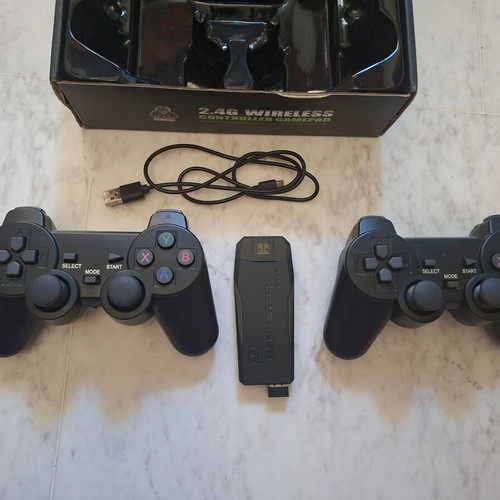Game Stick Lite portable retro gaming console with 2 wireless controllers