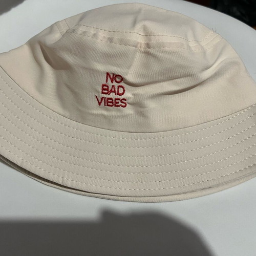 Hat new beige with No bad vibes embroidery