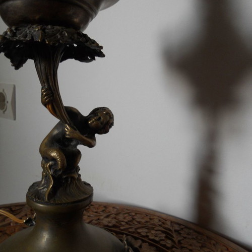Bronze table lamp with putto used, authentic antique