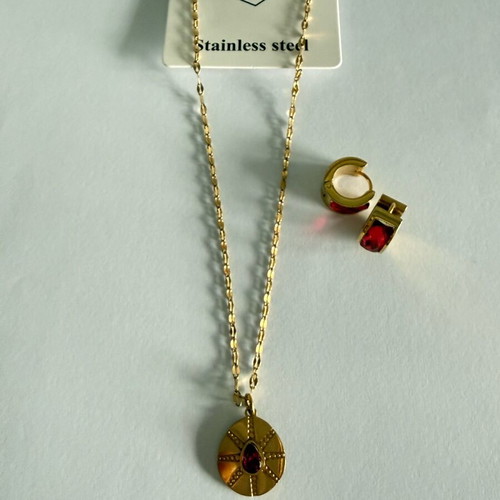 Steel earrings and necklace set like new, gold-colored