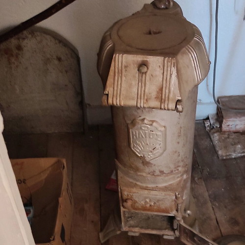 Cast iron stove used, requires maintenance