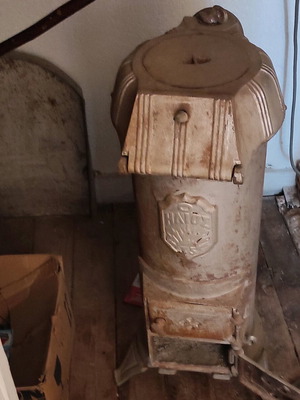 Cast iron stove used, requires maintenance