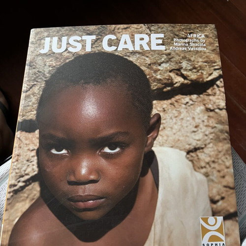 Just Care Photobook like new, bilingual Greek and English