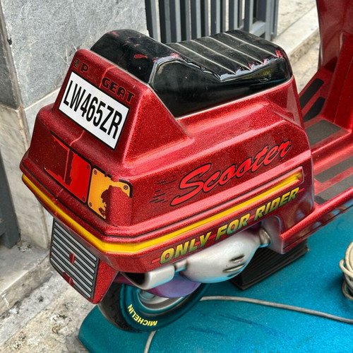 Coin-operated scooter used from the 90s, dimensions 74x106 cm