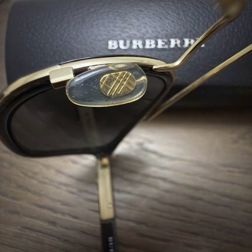 Burberry sunglasses like new, black and gold