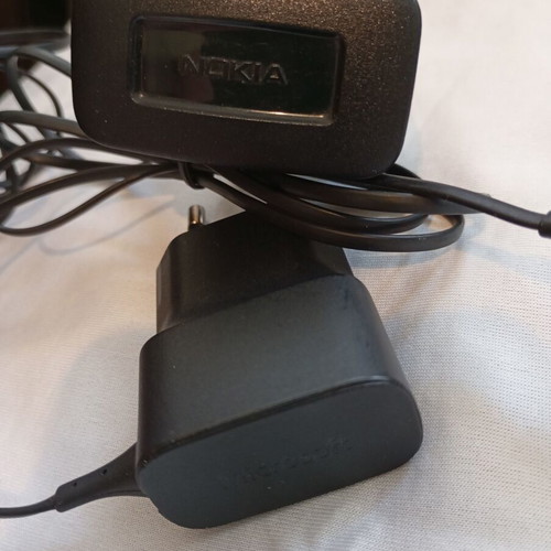 Nokia E66 retro slider phone used with original accessories