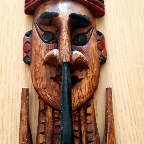 Collectible wooden handmade mask from Bali used