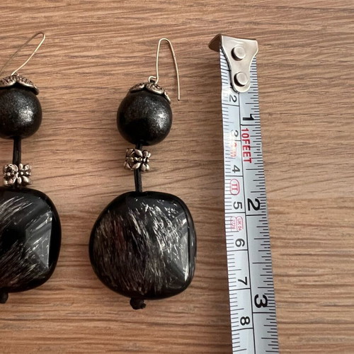 Women's hanging earrings used
