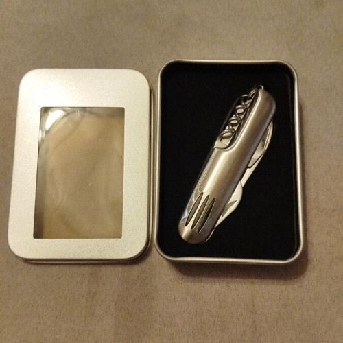 Pocket knife new in metal box unused