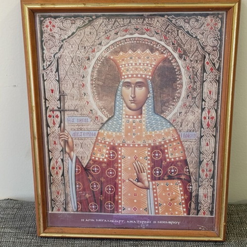 Vintage icon of Saint Catherine in frame with glass, used