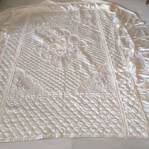 Bridal quilt satin with embroidered flowers and ruffles, like new