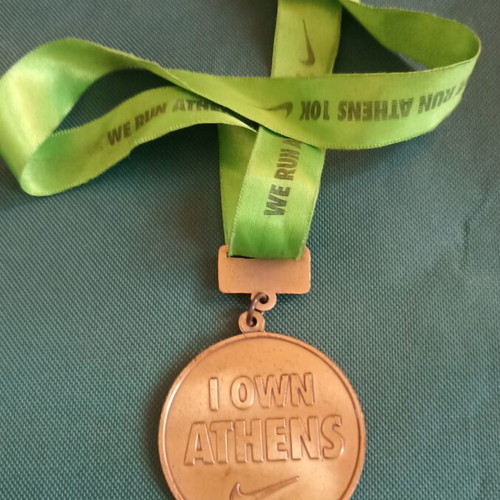 Nike We Run Athens 10K 2012 commemorative medal mint condition