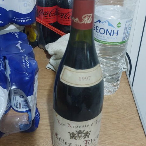 Côtes du Rhône 1997 wine bottle, sealed