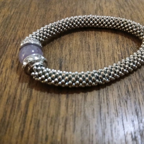 Women's bracelet with purple stone and white gems like new