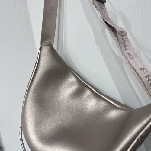 Frnc crossbody banana bag like new, metallic gold beige