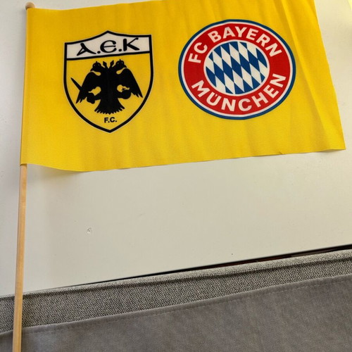AEK - Bayern Champions League flag new, authentic
