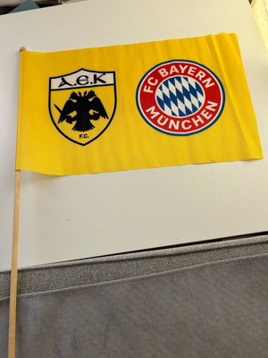 AEK - Bayern Champions League flag new, authentic
