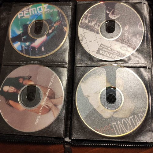 Set of 48 used music CDs with free case