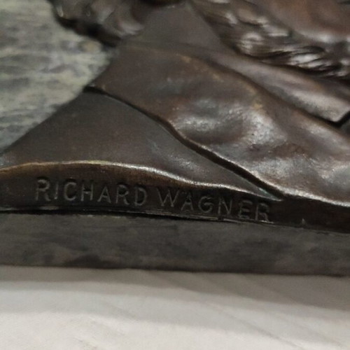 Vintage brass embossed Richard Wagner portrait on green marble used