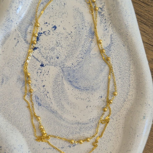Gold double rosary-style necklace with cross, stainless steel