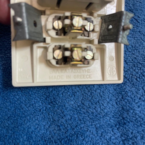 Double switch with socket white bakelite, new, Greek made