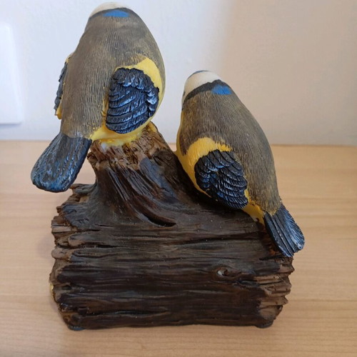 Two decorative birds like new