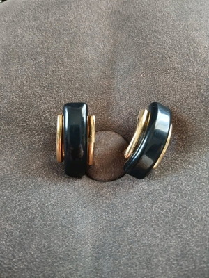 Clip earrings used, black and gold