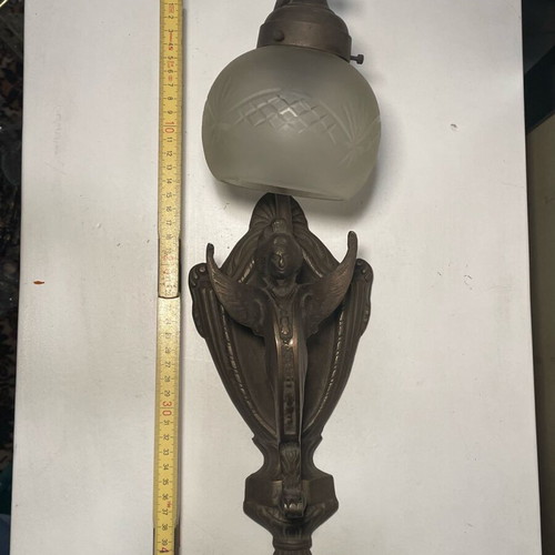 Bronze wall light like new with carved white glass and angel shape