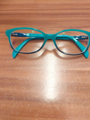 Tous eyeglasses used, turquoise
