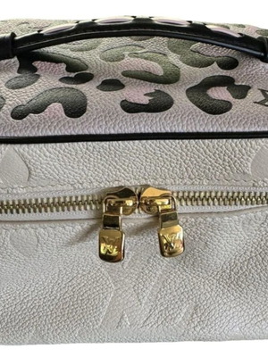 Louis Vuitton Vanity bag new, white leather with leopard print