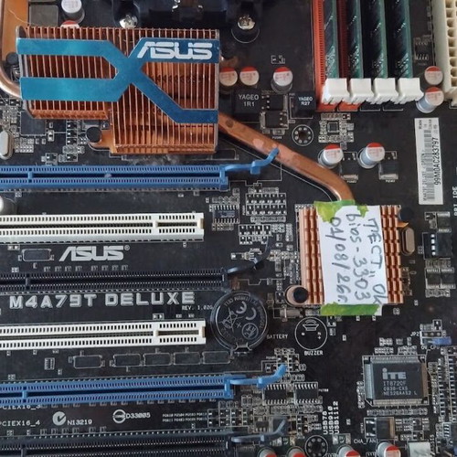 Asus M4A79T Deluxe motherboard used with CPU, fan and 16GB RAM