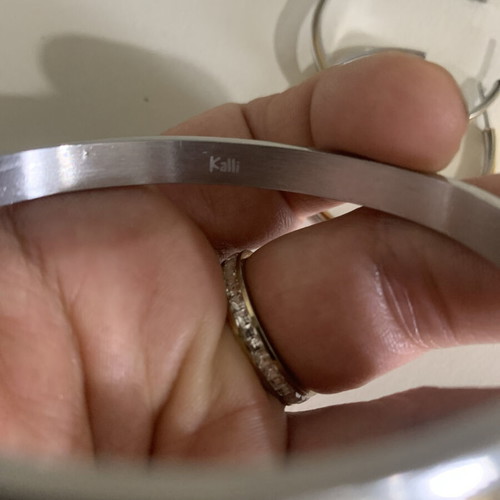 Kalli stainless steel set like new, gold and silver colors