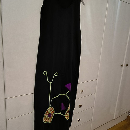 Platinum sleeveless dress like new with decorative front design