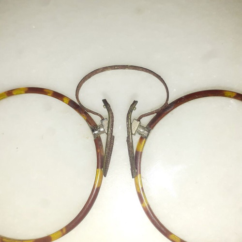 Presbyopia glasses antiques from 1920 used, brown and yellow