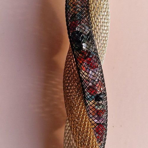 Bracelet like new with gold, silver and black net with beads
