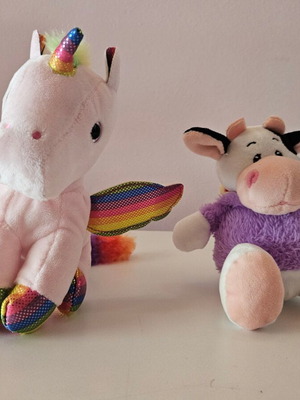 Stuffed unicorn and cow like new