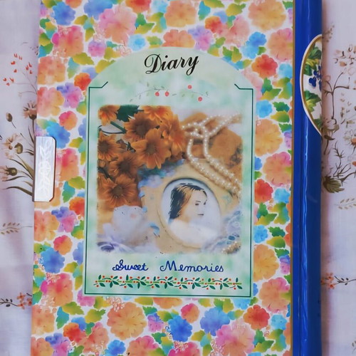 Vintage Romantic Diary like new with floral cover and metal clasp