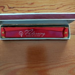Blessing harmonica like new, red with case