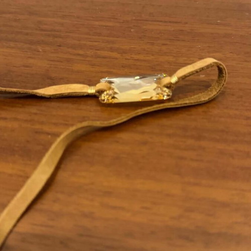 Leather bracelet with crystal in beige and gold tones, like new