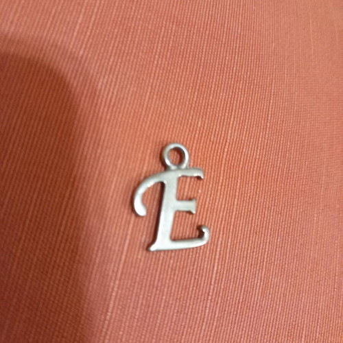 Silver pendant with letter E used