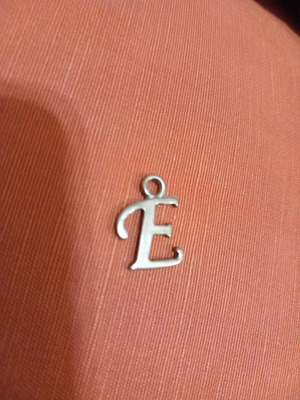 Silver pendant with letter E used