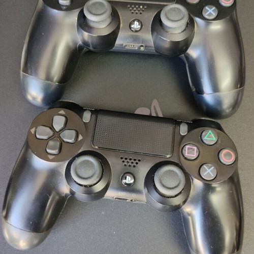 PlayStation 4 Slim like new with 2 controllers and 10 games