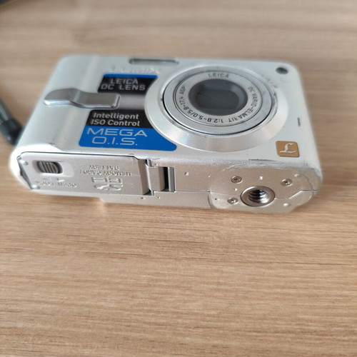 Panasonic Lumix DMC-FX12 digital camera used with accessories