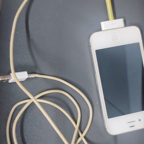 Apple iPhone 4s collector phone with case and 5 cables
