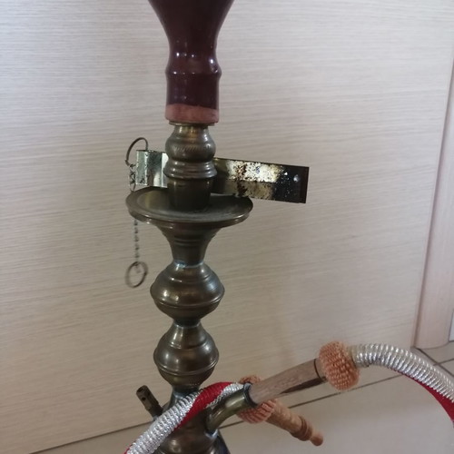 Oriental hookah used with stained glass bottle