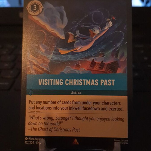 Disney Lorcana Winterspell Visiting Christmas Past Rare card like new
