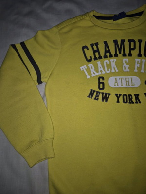 Champion yellow sweatshirt used for 9-10 years with blue print