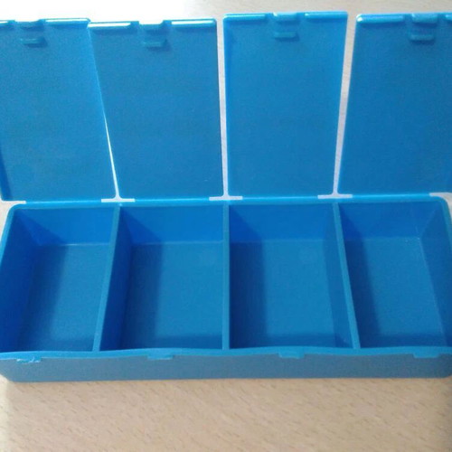 Collectible pill storage box, normal size, like new, blue, 4 compartments