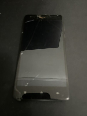 Homtom and Oukitel smartphones for parts or repair, with Nokia gift