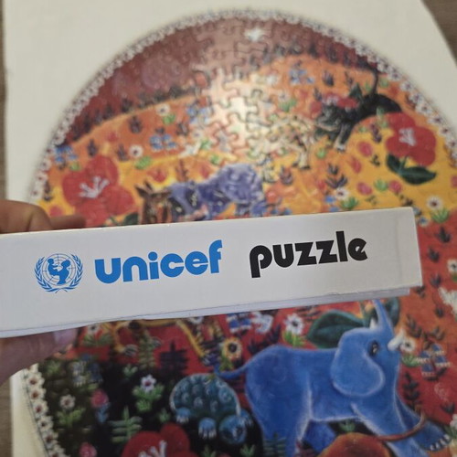 Unicef Red Delirium Puzzle like new, rare collector's item